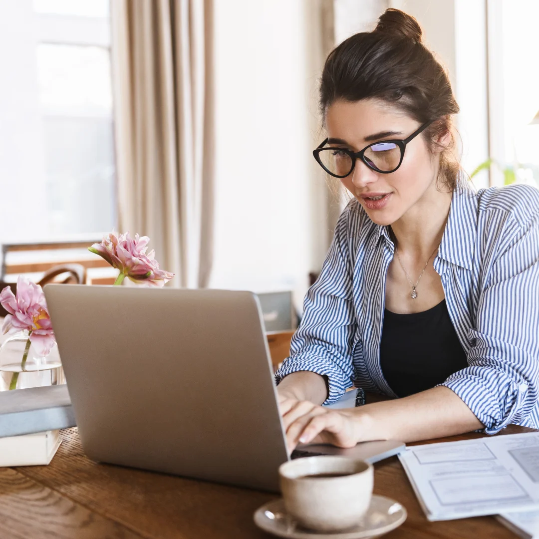a woman using a laptop